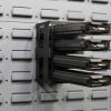 horizontal magazine holder on a gun wall