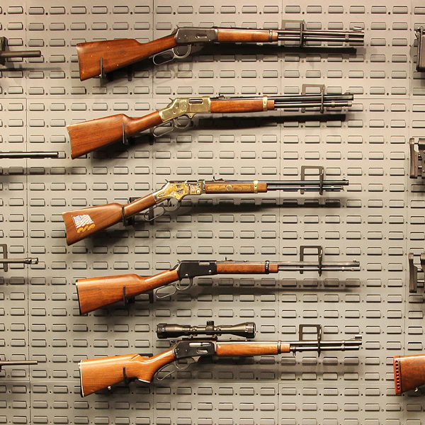 rifle display mounts on gun wall